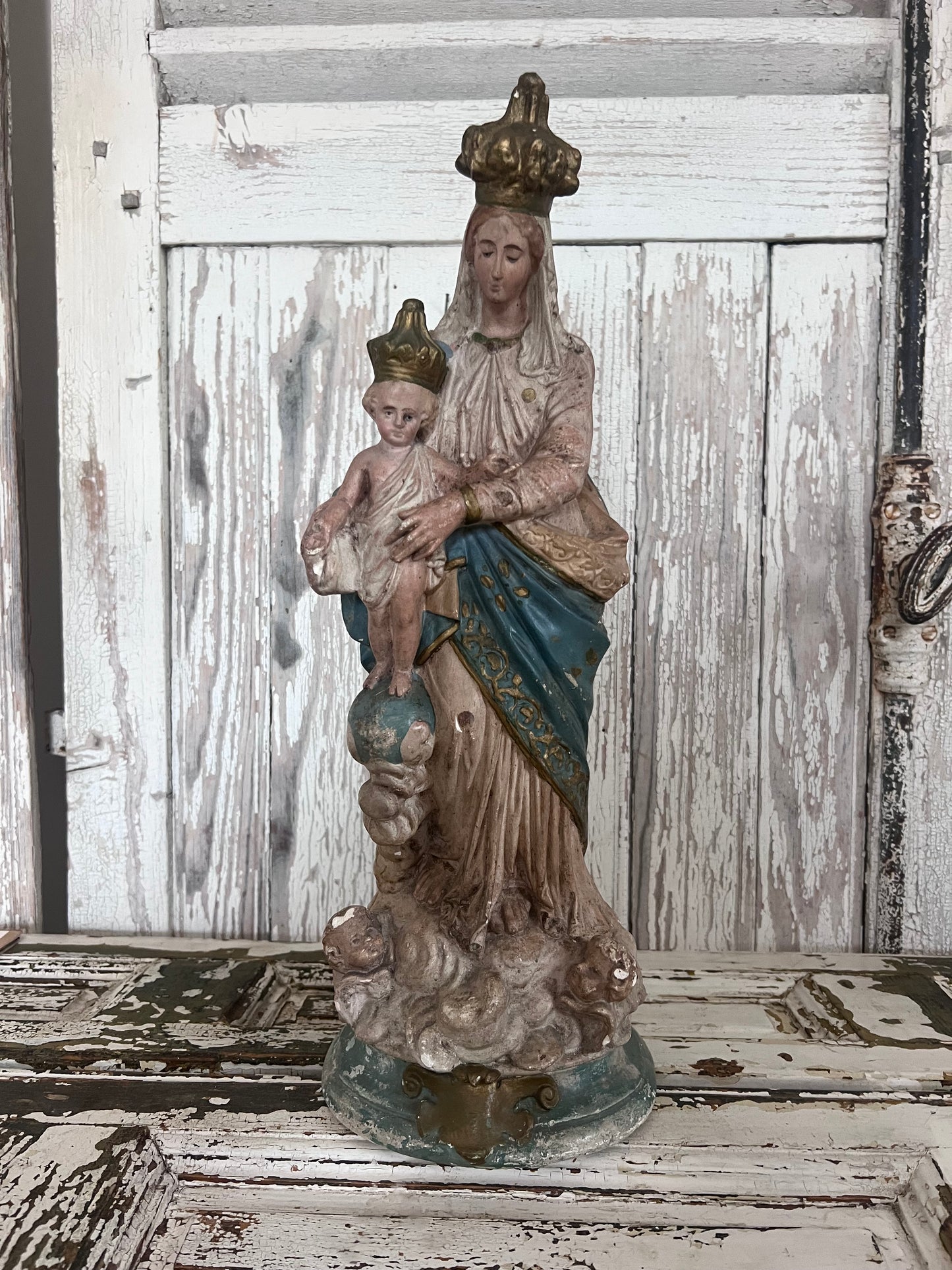 A wonderful faded Large French Madonna figure with baby Jesus and Cherubs